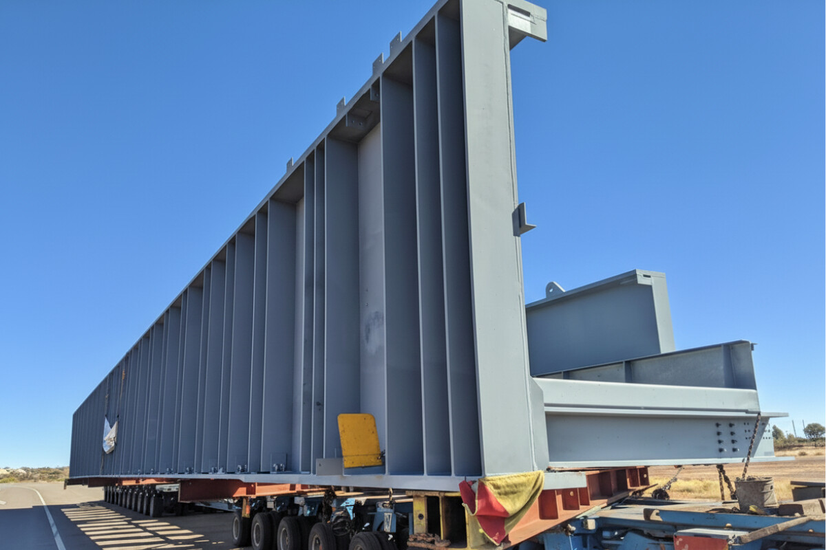 Transportation of oversize modular steel units on low bed trailer